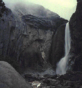 Waterfall and small mountain creek in the Bernese Oberland